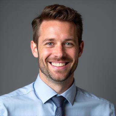 Professional headshot of Ben Carter, a friendly man in his 30s.